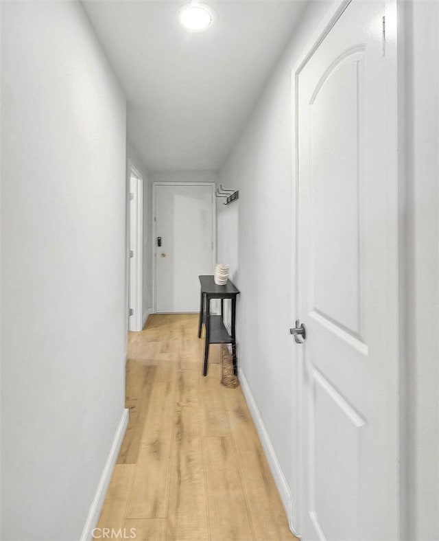 810 Edgewood St Unit 302, Inglewood, CA 90302 - hall with light wood-style floors and baseboards