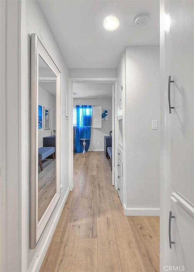 810 Edgewood St Unit 302, Inglewood, CA 90302 - corridor featuring light wood-style flooring and baseboards