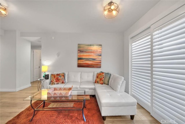 810 Edgewood St Unit 302, Inglewood, CA 90302 - living area featuring baseboards and light wood-style floors
