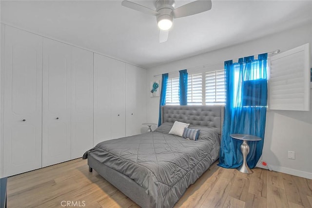 810 Edgewood St Unit 302, Inglewood, CA 90302 - bedroom with wood finished floors, a ceiling fan, a closet, and baseboards