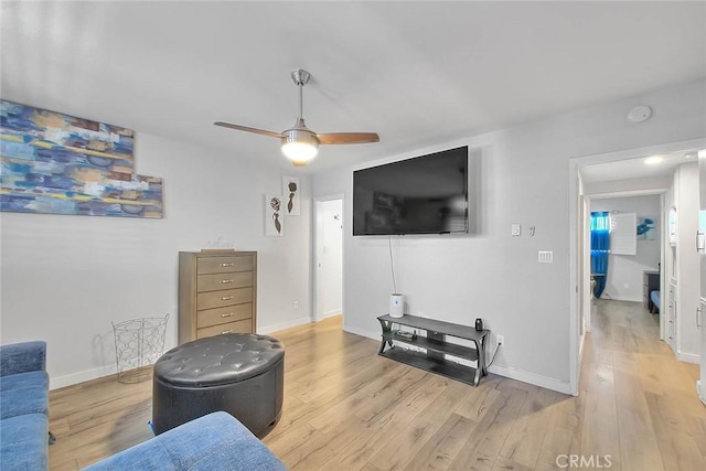 810 Edgewood St Unit 302, Inglewood, CA 90302 - living area with light wood-type flooring, ceiling fan, and baseboards