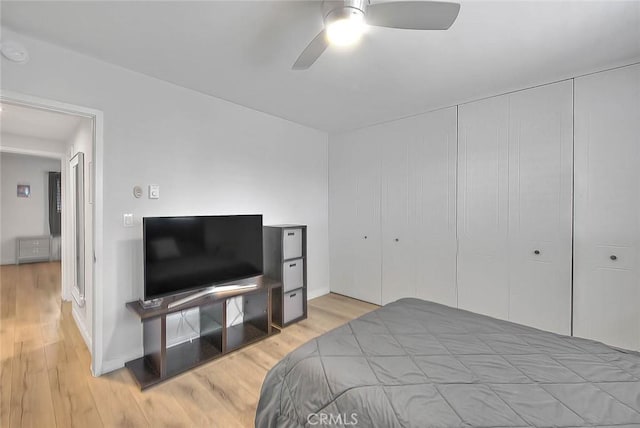 810 Edgewood St Unit 302, Inglewood, CA 90302 - bedroom with wood finished floors, a closet, a ceiling fan, and baseboards