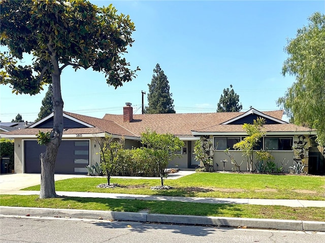 2815 E Coolidge Ave, Orange, CA 92867 - single story home with a front yard, an attached garage, concrete driveway, and a chimney