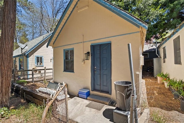 632 Leebert Way, Crestline, CA 92325 - doorway to property with stucco siding