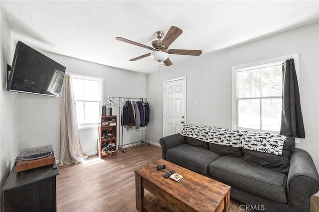 632 Leebert Way, Crestline, CA 92325 - living room with wood finished floors, a ceiling fan, and baseboards