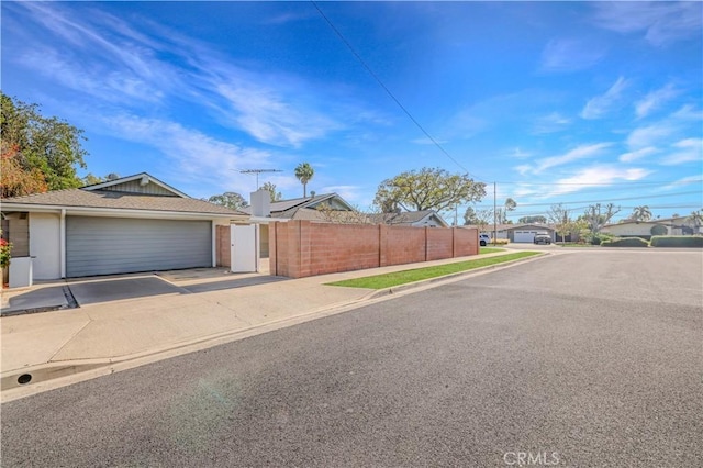 14242 Clarissa Ln, North Tustin, CA 92705 - view of asphalt street with sidewalks and curbs