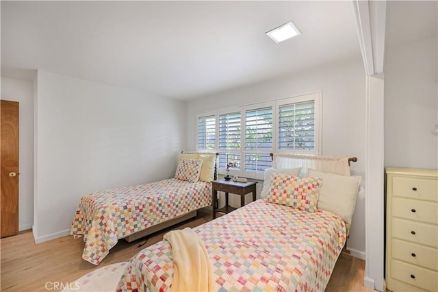 14242 Clarissa Ln, North Tustin, CA 92705 - bedroom with wood finished floors and baseboards
