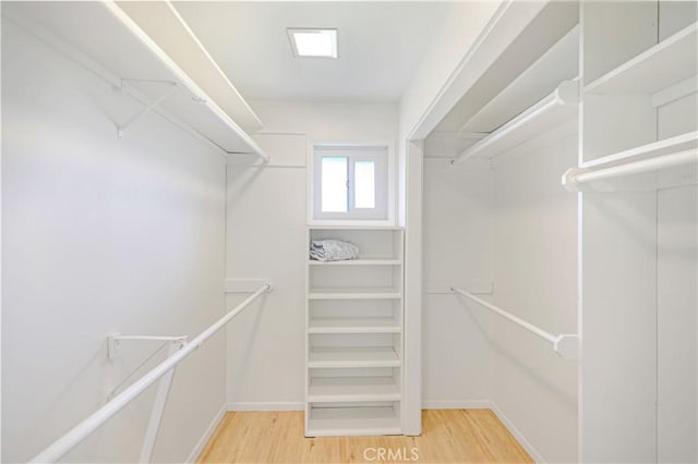 14242 Clarissa Ln, North Tustin, CA 92705 - walk in closet with wood finished floors
