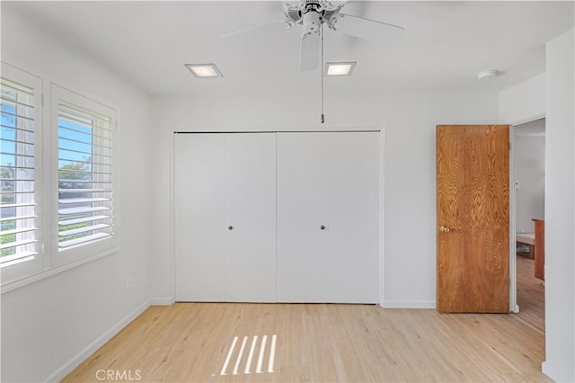 14242 Clarissa Ln, North Tustin, CA 92705 - unfurnished bedroom featuring a closet, wood finished floors, baseboards, and a ceiling fan