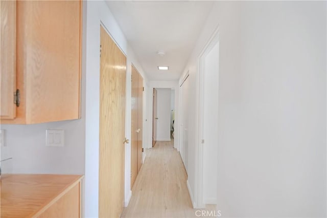 14242 Clarissa Ln, North Tustin, CA 92705 - corridor with baseboards and light wood finished floors