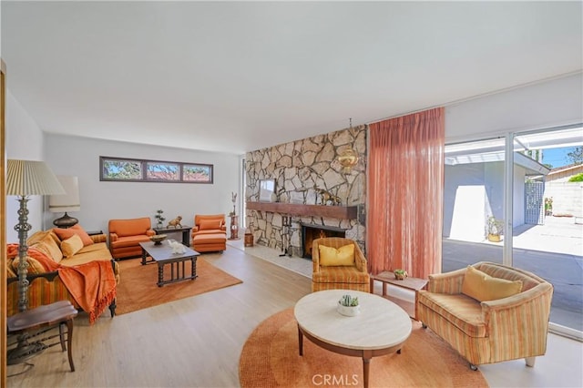 14242 Clarissa Ln, North Tustin, CA 92705 - living area with wood finished floors and a fireplace