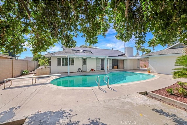 14242 Clarissa Ln, North Tustin, CA 92705 - view of pool with a patio area, a fenced backyard, and a diving board
