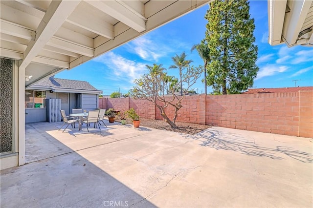 14242 Clarissa Ln, North Tustin, CA 92705 - fenced backyard featuring outdoor dining space and a patio area