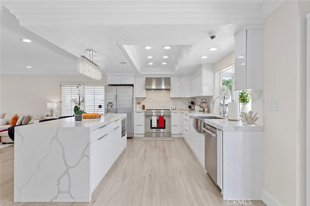2160 S Hammatt, Anaheim, CA 92802 - kitchen with stainless steel appliances, wall chimney exhaust hood, modern cabinets, crown molding, and a sink