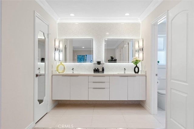 2160 S Hammatt, Anaheim, CA 92802 - bathroom featuring crown molding, double vanity, toilet, tasteful backsplash, and tile patterned flooring