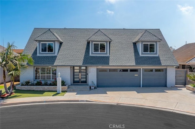 2160 S Hammatt, Anaheim, CA 92802 - view of front of home featuring brick siding, an attached garage, concrete driveway, and roof with shingles