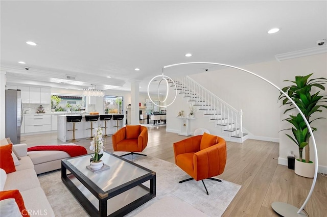 2160 S Hammatt, Anaheim, CA 92802 - living area with recessed lighting, stairs, light wood finished floors, decorative columns, and baseboards