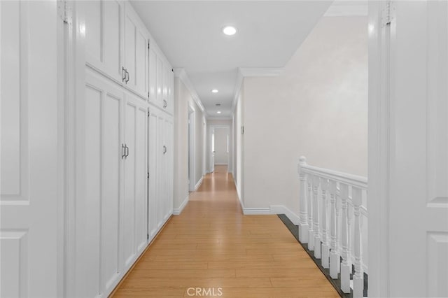 2160 S Hammatt, Anaheim, CA 92802 - hallway featuring recessed lighting, light wood-style flooring, an upstairs landing, and baseboards