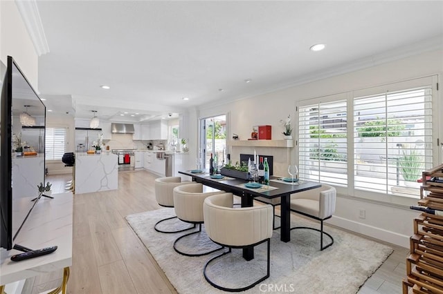 2160 S Hammatt, Anaheim, CA 92802 - dining area with crown molding, recessed lighting, light wood-type flooring, and baseboards