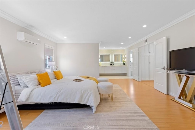 2160 S Hammatt, Anaheim, CA 92802 - bedroom featuring a wall unit AC, light wood finished floors, ornamental molding, recessed lighting, and connected bathroom