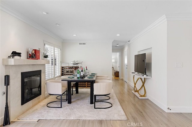 2160 S Hammatt, Anaheim, CA 92802 - dining room featuring ornamental molding, wood finished floors, a fireplace, baseboards, and recessed lighting