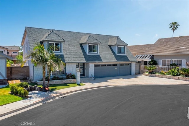 2160 S Hammatt, Anaheim, CA 92802 - view of front of home featuring driveway and brick siding