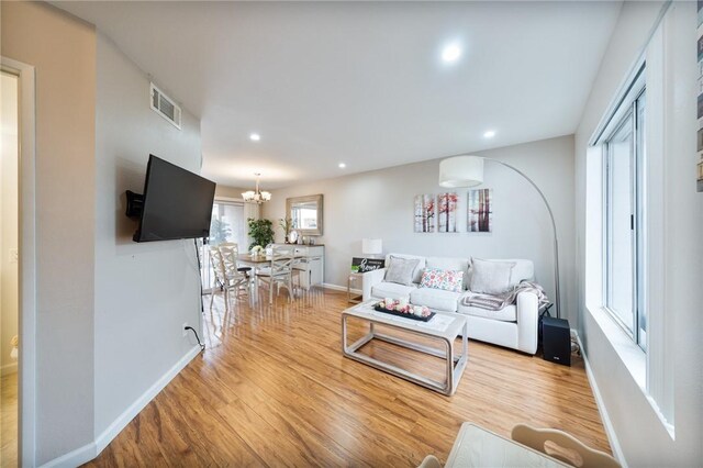22123 Figueroa St Unit 144, Carson, CA 90745 - living room featuring wood finished floors, a chandelier, recessed lighting, and baseboards