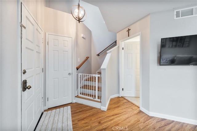 22123 Figueroa St Unit 144, Carson, CA 90745 - entryway with wood finished floors, stairs, and baseboards
