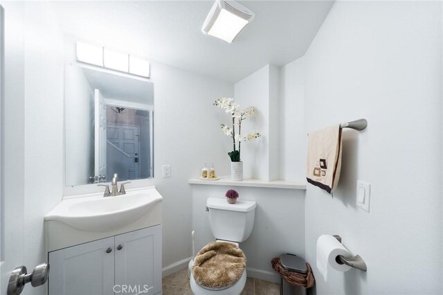 22123 Figueroa St Unit 144, Carson, CA 90745 - bathroom with vanity, toilet, and baseboards