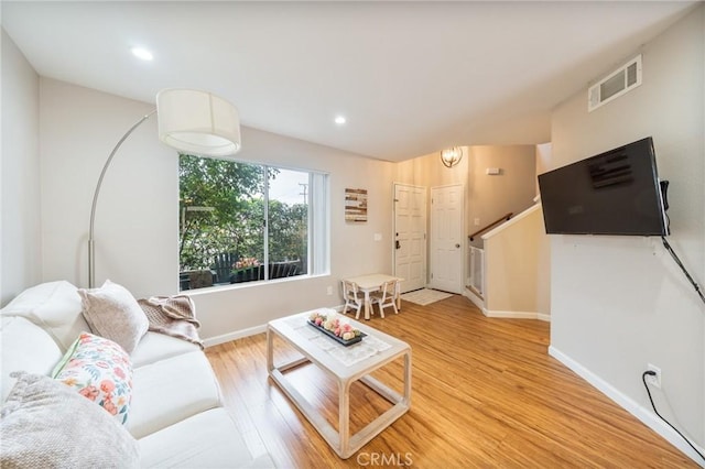 22123 Figueroa St Unit 144, Carson, CA 90745 - living room with light wood finished floors, baseboards, and recessed lighting