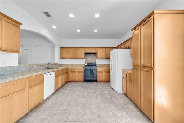 1760 Terrace Ave, Colton, CA 92324 - kitchen featuring white appliances, light countertops, recessed lighting, and under cabinet range hood