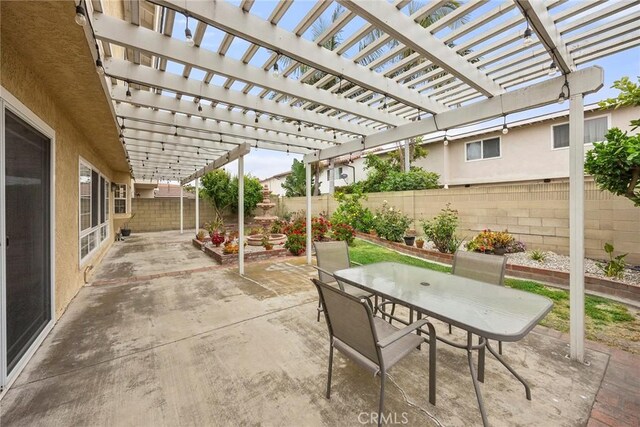 4541 Amberwood Ave, La Palma, CA 90623 - fenced backyard featuring a patio and outdoor dining space