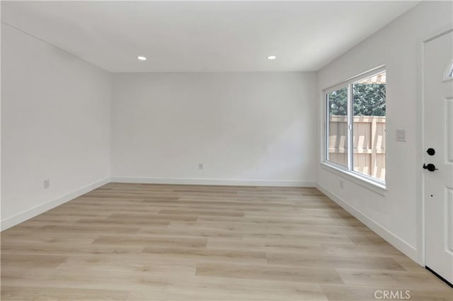 31278 Calle San Juan Unit 12F, San Juan Capistrano, CA 92675 - unfurnished room featuring baseboards, light wood-style floors, and recessed lighting