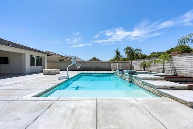 12312 Ashlyn Dr, Bakersfield, CA 93311 - view of swimming pool with a patio area, a fenced backyard, and a hot tub
