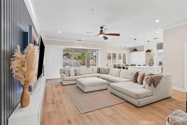 12312 Ashlyn Dr, Bakersfield, CA 93311 - living room with ornamental molding, a ceiling fan, light wood-style floors, and recessed lighting