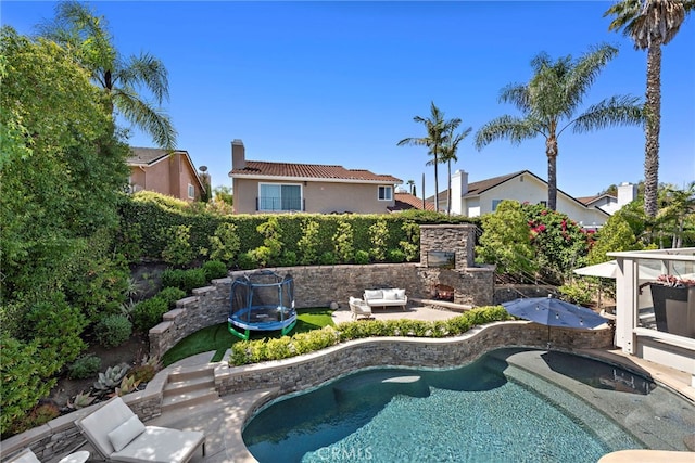 23982 Cormorant Ln, Laguna Niguel, CA 92677 - view of pool with outdoor lounge area, a patio area, and a trampoline