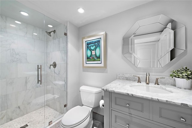 23982 Cormorant Ln, Laguna Niguel, CA 92677 - bathroom with toilet, vanity, a shower stall, and recessed lighting