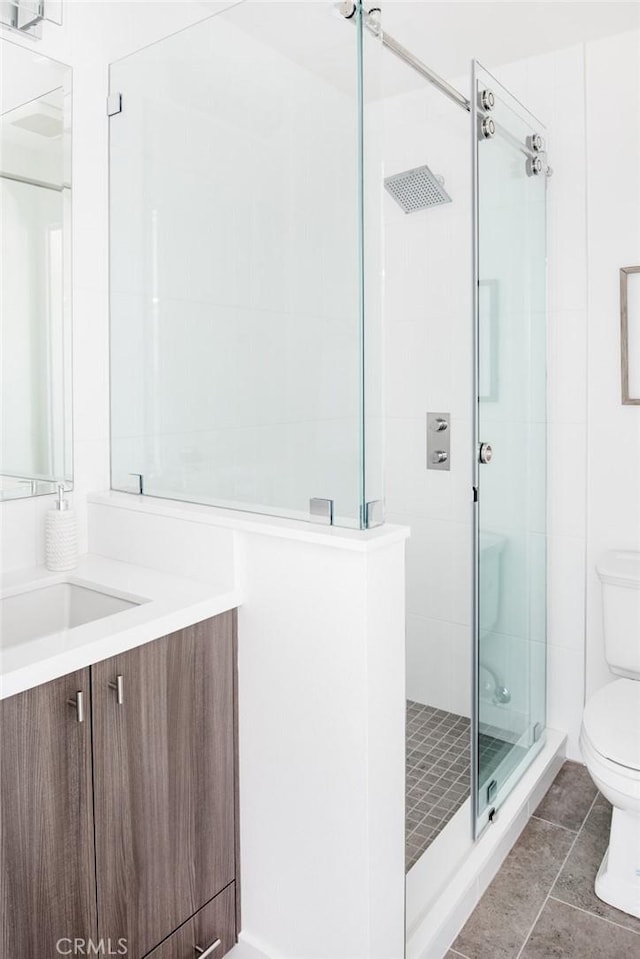 312 35th St, Newport Beach, CA 92663 - bathroom with toilet, a stall shower, vanity, and tile patterned flooring