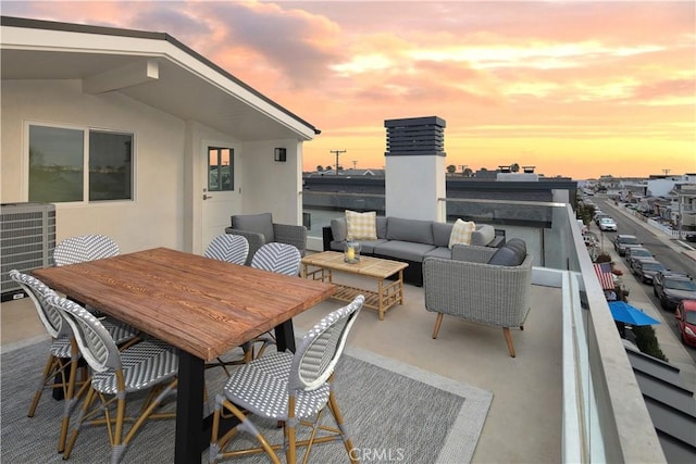 312 35th St, Newport Beach, CA 92663 - patio terrace at dusk featuring an outdoor hangout area and central air condition unit