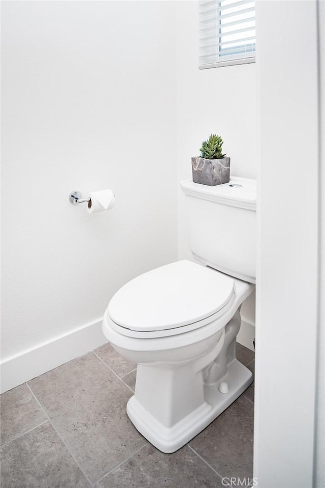 312 35th St, Newport Beach, CA 92663 - bathroom with toilet, baseboards, and tile patterned flooring