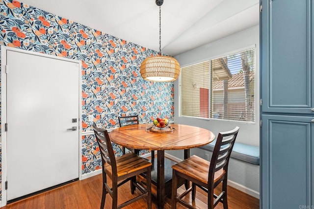 3374 Avocado Vista Ln, Fallbrook, CA 92028 - dining area with wallpapered walls, baseboards, wood finished floors, and vaulted ceiling