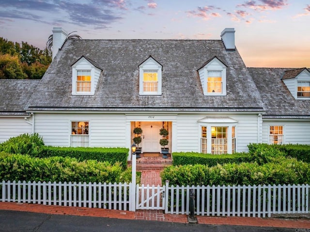 7716 Lookout Dr, La Jolla, CA 92037 - cape cod home featuring a chimney and a fenced front yard