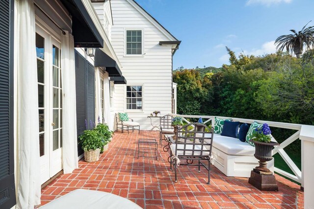 7716 Lookout Dr, La Jolla, CA 92037 - view of patio / terrace featuring french doors