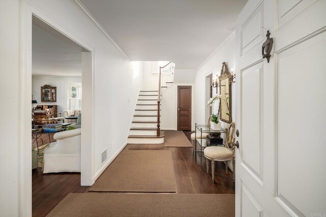 7716 Lookout Dr, La Jolla, CA 92037 - corridor featuring wood finished floors, stairway, and ornamental molding
