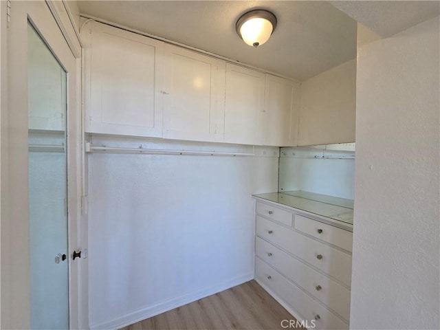 455 E Ocean Blvd Unit 715, Long Beach, CA 90802 - spacious closet featuring light wood-style floors