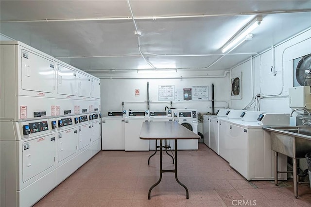 455 E Ocean Blvd Unit 715, Long Beach, CA 90802 - community laundry room with stacked washer and clothes dryer, separate washer and dryer, and light flooring