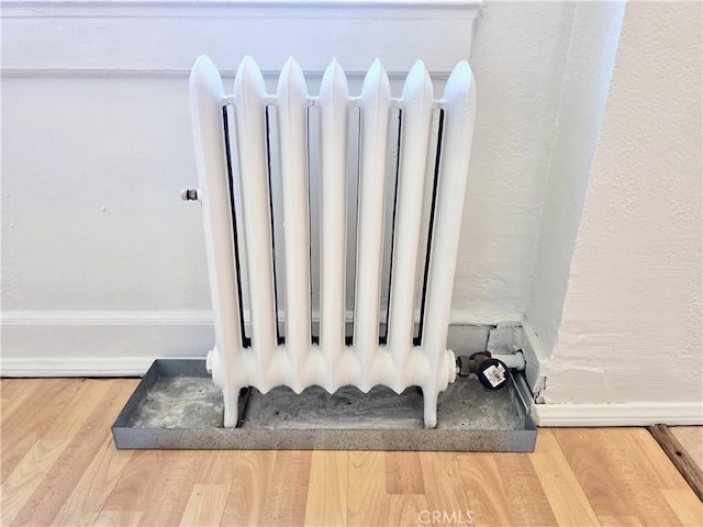 455 E Ocean Blvd Unit 715, Long Beach, CA 90802 - detailed view of radiator heating unit and wood finished floors