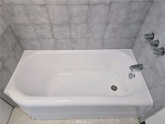 455 E Ocean Blvd Unit 715, Long Beach, CA 90802 - bathroom with a tub to relax in and tile patterned flooring