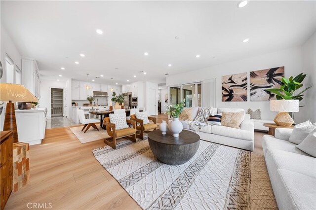 72 Crater, Irvine, CA 92618 - living area featuring recessed lighting and light wood finished floors