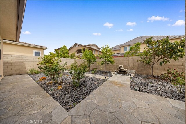 72 Crater, Irvine, CA 92618 - fenced backyard with a patio